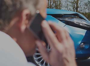 man calling to report car accident