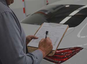 parramatta smash repair technician conducting inspection on mercedes benz